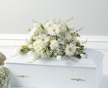 A casket spray Childs/Gerbs,Tulips,Roses