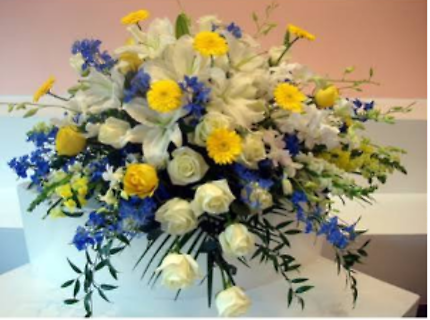 A Casket Spray/Gerbs,Roses,Snaps,Lilies,Delphinium