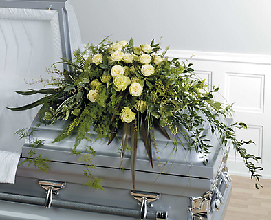 A Foilage and Rose Casket Spray